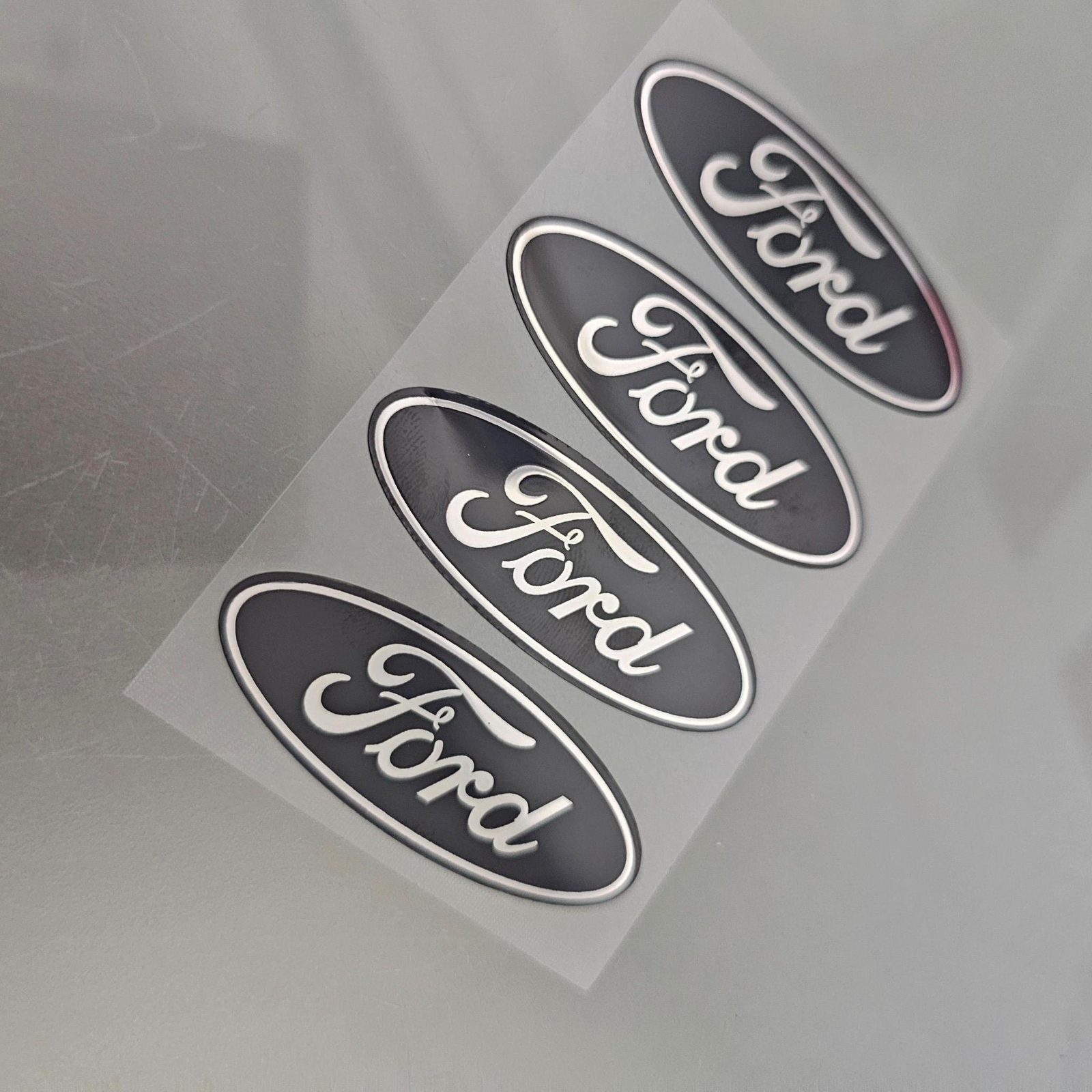 4-FORD CENTER CAP LOGOS BLACK OVAL DECALS VINYL F150 F250 MUSTANG FOCUS FUSION
